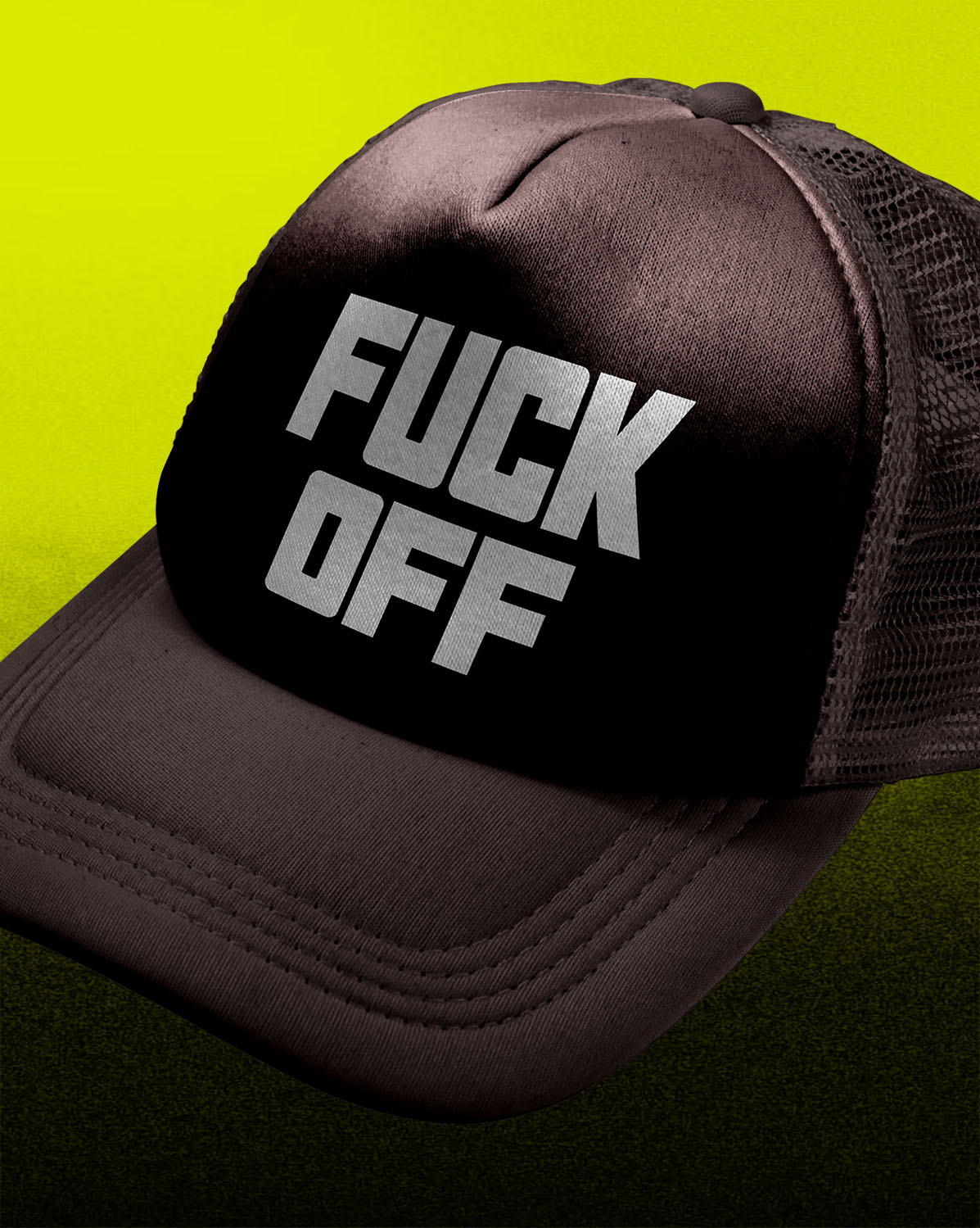 A black trucker hat with a bold white graphic reading 'FUCK OFF' on the front panel, shown against a bright yellow-to-dark-green gradient background.