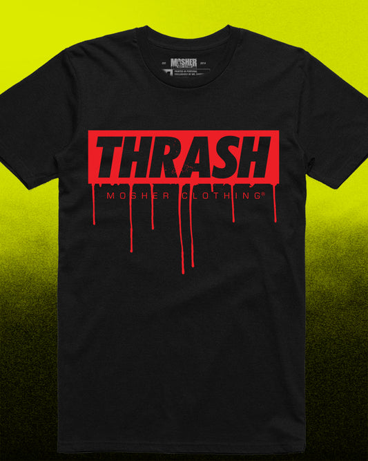 A black short-sleeve t-shirt featuring a red rectangular graphic on the chest with the word 'THRASH' in black letters and red dripping text below reading 'MOSHER CLOTHING'. The shirt is displayed flat against a bright yellow-to-black gradient background.