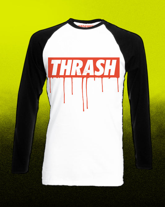A long-sleeve raglan baseball t-shirt with a white body and black sleeves, featuring a red rectangular 'THRASH' graphic on the chest with red dripping paint details, set against a bright yellow-to-black gradient background.